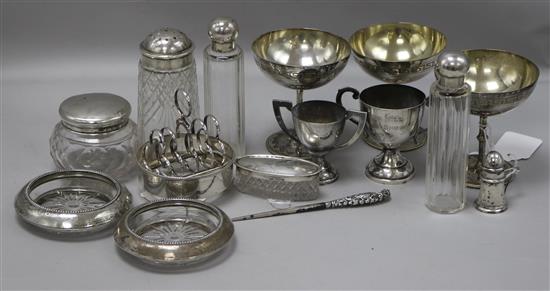 A small collection of silver, silver-mounted and plated items, including toilet jars, pepper, butter dishes etc.